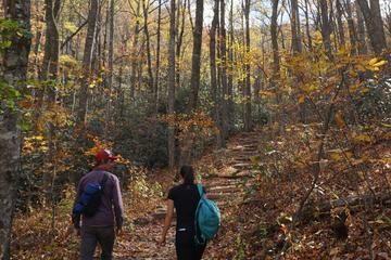 Billy Meeker) Drew Powell and Kimala Luna walking up to Lookout Mountain in Montreat, NC.